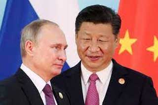 Putin and Xi talk